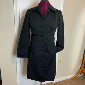 NWOT Nine West Black Long Trench
Coat Buttons down front & ribbon details
